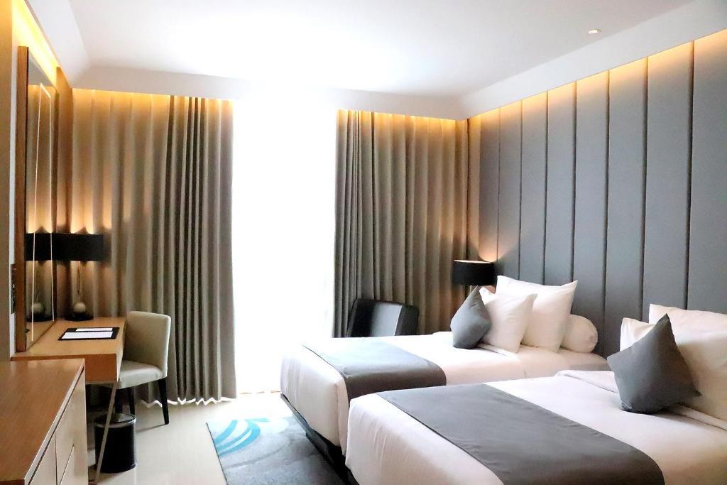 แกรนด์ ดาฟาม ซิกเนเจอร์ สุราบายา Hotel ภายนอก รูปภาพ